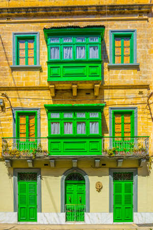 Facades of historical houses in the old town of Senglea, Maltaの写真素材