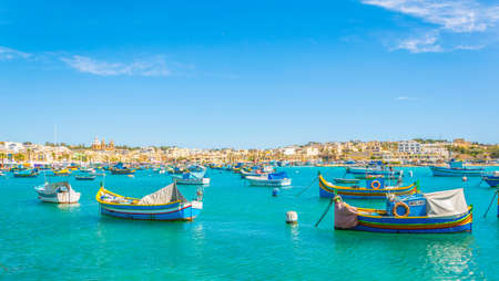 Colorful fishing boats moor in Marsaxlokk, Maltaのeditorial素材