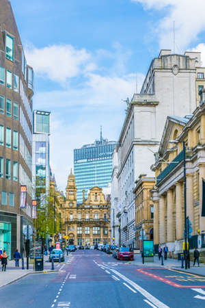 MANCHESTER, UNITED KINGDOM, APRIL 11, 2017: People are walking on a street in Manchester, Englandのeditorial素材