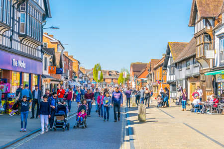 STRATFORD UPON AVON, UNITED KINGDOM, APRIL 8, 2017: People are strolling alongside traditional wooden houses in Stratford upon Avon, Englandのeditorial素材