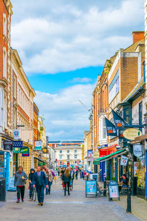 LINCOLN, UNITED KINGDOM, APRIL 10, 2017: People are walking on a street in Lincoln, Englandのeditorial素材