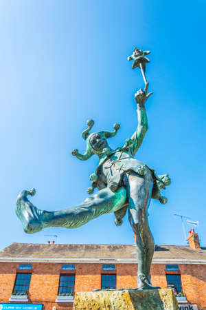 STRATFORD UPON AVON, UNITED KINGDOM, APRIL 8, 2017: A joker statue in Stratford upon Avon, Englandのeditorial素材