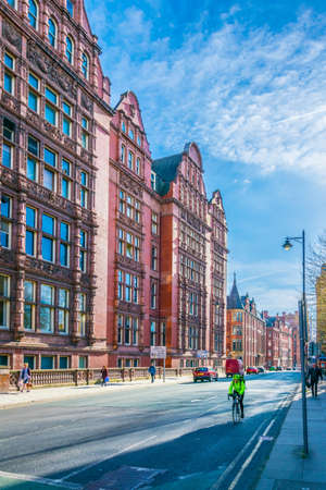 MANCHESTER, UNITED KINGDOM, APRIL 11, 2017: View of a classical brick house street in Manchester,...