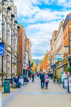 LINCOLN, UNITED KINGDOM, APRIL 10, 2017: People are walking on a street in Lincoln, Englandのeditorial素材