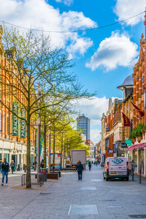 LEICESTER, UNITED KINGDOM, APRIL 10, 2017: People are walking on a street in Leicester, England