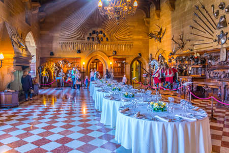 WARWICK, UNITED KINGDOM, APRIL 8, 2017: View of a dining hall of the Warwick castle, Englandのeditorial素材