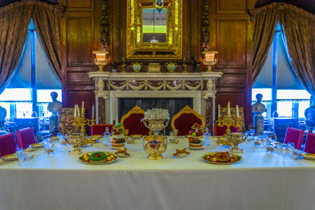 WARWICK, UNITED KINGDOM, APRIL 8, 2017: View of a dining hall of the Warwick castle, Englandのeditorial素材