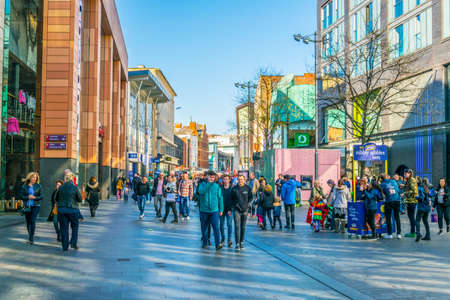 LIVERPOOL, UNITED KINGDOM, APRIL 7, 2017: People are walking through the business center of Liverpool, Englandのeditorial素材