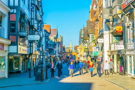 CHESTER, UNITED KINGDOM, APRIL 7, 2017: Traditional tudor houses alongside the Bridge street in the central Chester, Englandのeditorial素材