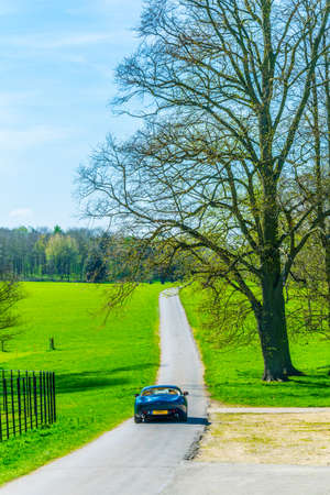 STAMFORD, UNITED KINGDOM, APRIL 9, 2017: View of a car show taking place at the Burghley House grounds near Stamford, Englandのeditorial素材
