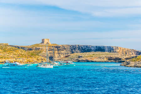 COMINO, MALTA, MAY 1, 2017: Tourist boats are anchoring near comino island, Maltaのeditorial素材