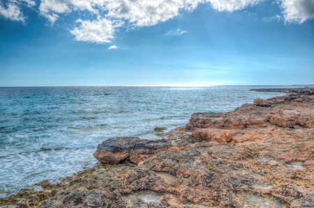 Ragged coast of Mallorca at Cap de Ses Salinesの写真素材