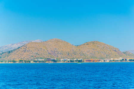 Holiday resorts stretched alongside Alcudia beach on Mallorca, Spainの写真素材