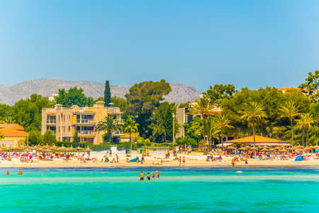 Holiday resorts stretched alongside Alcudia beach on Mallorca, Spainの写真素材