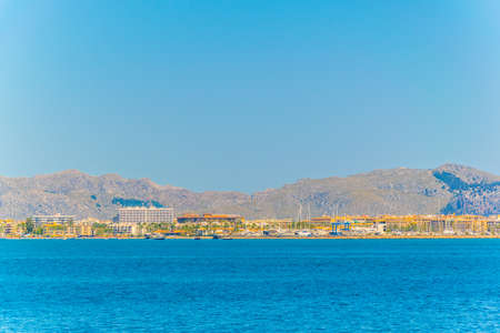 Holiday resorts stretched alongside Alcudia beach on Mallorca, Spainの写真素材
