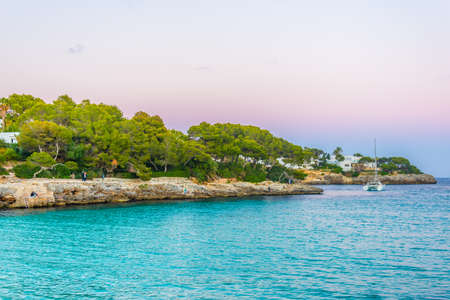 Sunset view of Cala d'or bay at Mallorca, Spain