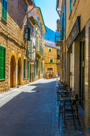 a narrow street in the spanish town Soller at Mallorcaの写真素材