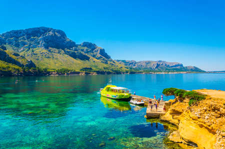 ES CALO, SPAIN, MAY 25, 2017: Tourist are having a stop during a cruise at es calo bay, Mallorca, Spainのeditorial素材