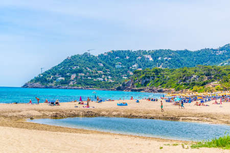 CANYAMEL, SPAIN, MAY 21, 2017: People are enjoying summer on Canyamel beach on Mallorca, Spainのeditorial素材