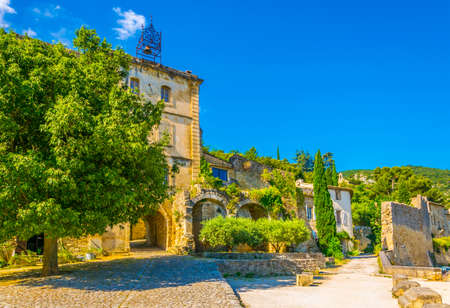 View of a central square in Oppede le Vieux village in Franceの写真素材
