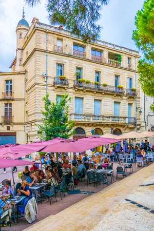 MONTPELLIER, FRANCE, JUNE 25, 2017: People are strolling through a narrow street in the center of Montpellier, Franceのeditorial素材