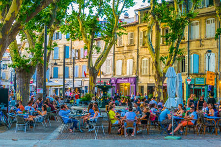 AVIGNON, FRANCE, JUNE 19, 2017: People are strolling through a narrow street in the center of Avignon, Franceのeditorial素材
