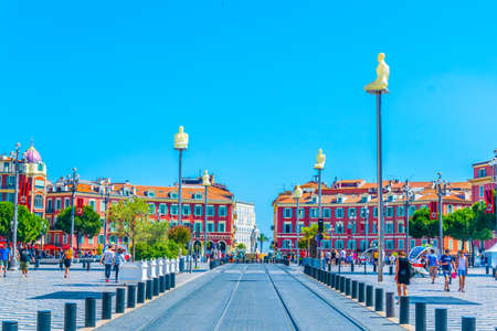NICE, FRANCE, JUNE 11, 2017: People are strolling through massena square in the center of Nice, Franceのeditorial素材