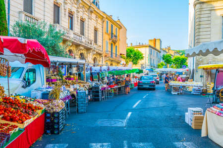 APT, FRANCE, JUNE 23, 2017: People are strolling through a street market in the center of Apt, Franceのeditorial素材