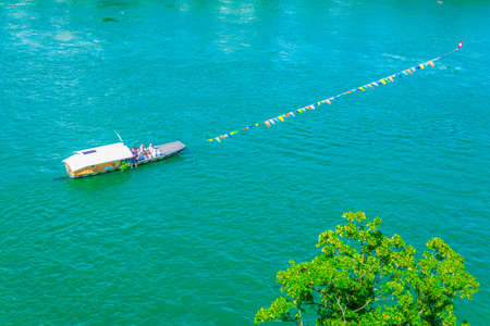 Traditional ferry is crossing rhine river in Basel, Switzerland