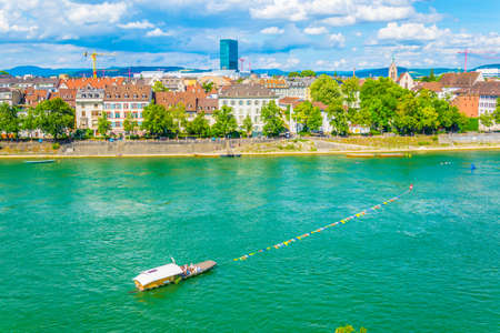Traditional ferry is crossing rhine river in Basel, Switzerlandの写真素材
