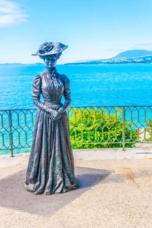 Statue of a gentleman and a lady in Neuchatel, Switzerlandの写真素材