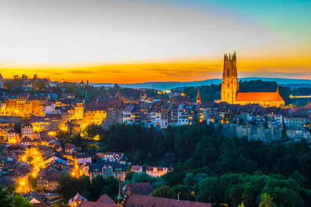 Sunset view over skyline of Fribourg, Switzerlandの写真素材