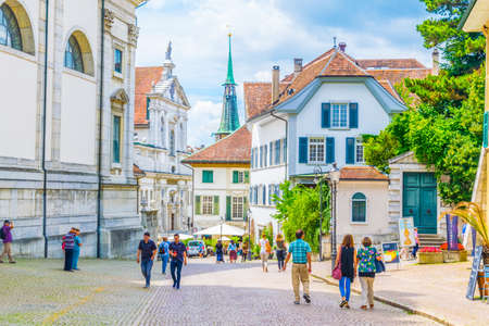 SOLOTHURN, SWITZERLAND, JULY 15, 2017: People are strolling through Hauptgasse street in the historical center of Solothurn, Switzerlandのeditorial素材