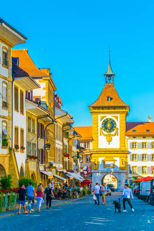 MURTEN, SWITZERLAND, JULY 16, 2017: Tourists are strolling through the historical center of Murten, Switzerlandのeditorial素材