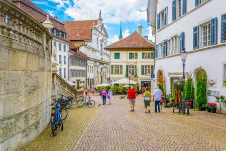 SOLOTHURN, SWITZERLAND, JULY 15, 2017: People are strolling through Hauptgasse street in the historical center of Solothurn, Switzerlandのeditorial素材