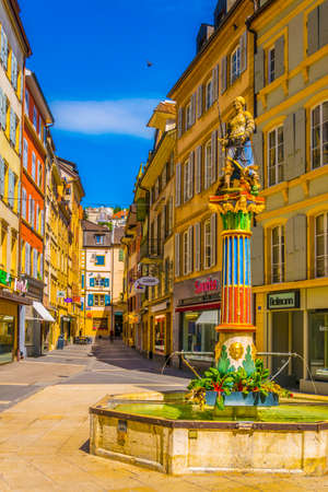 NEUCHATEL, SWITZERLAND, JULY 16, 2017: Justice fountain in the old town of Neuchatel, Switzerlandのeditorial素材