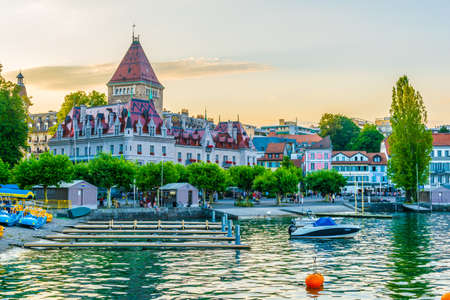 LAUSANNE,  SWITZERLAND, JULY 18, 2017: Sunset view of the Chateau d'Ouchy hotel at Lausanne,...