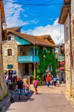 YVOIRE, France, JULY 21, 2017: People are strolling through medieval heart of french town Yvoireのeditorial素材