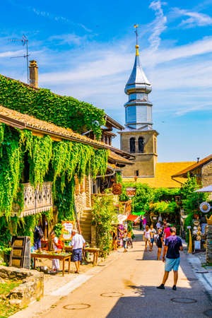 YVOIRE, France, JULY 21, 2017: People are strolling through medieval heart of french town Yvoireのeditorial素材