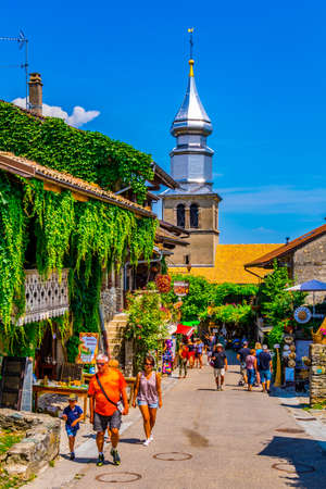 YVOIRE, France, JULY 21, 2017: People are strolling through medieval heart of french town Yvoireのeditorial素材