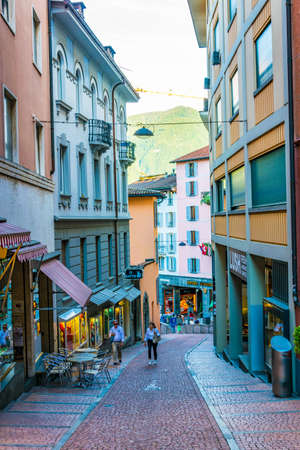 LUGANO, SWITZERLAND, JULY 24, 2017: People are strolling though a street in the center of Swiss city Luganoのeditorial素材