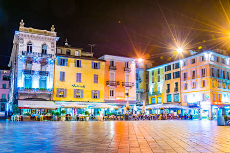 LUGANO, SWITZERLAND, JULY 24, 2017: Night view of the central square in Lugano, Switzerlandのeditorial素材