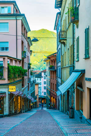 LUGANO, SWITZERLAND, JULY 24, 2017: People are strolling though a street in the center of Swiss city Luganoのeditorial素材