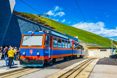 LUGANO, SWITZERLAND, JULY 25, 2017: People are leaving tourist train on top of Monte Generoso mountain in Switzerlandのeditorial素材