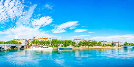 LYON, FRANCE, JULY 23, 2017: Riverside of Rhone river with Part Dieu center on background in Lyon,...