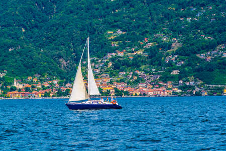CANNOBIO, ITALY, JULY 27, 2017: Yacht on Lago Maggiore lake in Switzerland and Italyのeditorial素材