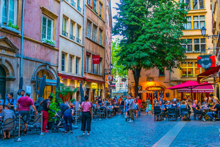 LYON, FRANCE, JULY 23, 2017: People are strolling through the old town of lyon during sunset, France