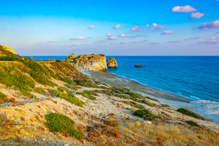 Sunset view over Petra tou Romiou alas Aphordite's rock on Cyprus
