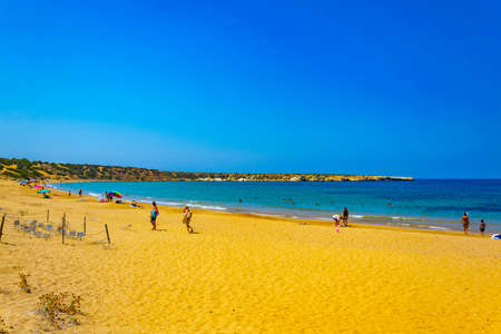 LARA BEACH, CYPRUS, AUGUST 19, 2017: People are walking on Lara beach on Cyprusのeditorial素材