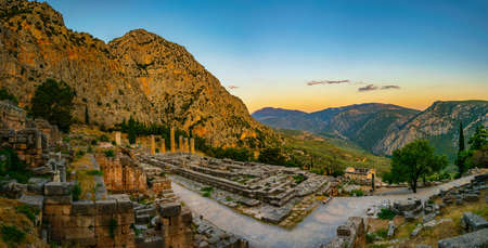 Sunset view of ruins of temple of Apollo at ancient Delphi, Greece